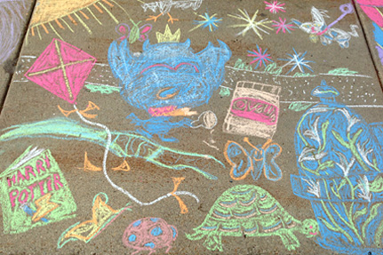 Several Colorful Doodles on the sidewalk